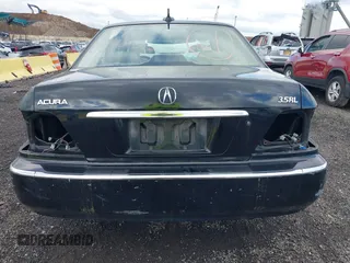 2004 Acura RL w/Navigation System with VIN JH4KA96624C003779, listed as a IAAI auction lot 39542033 with 80,018 mi miles. Bid and sale history available at carsss.com. Image 12.