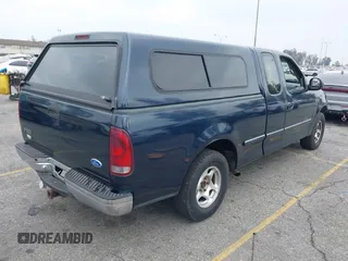 1997 Ford F-150 with VIN 1FTDX1725VKA52830, listed as a IAAI auction lot 41462465 with 169,379 mi miles and . Bid and sale history available at DreamBid. Image 4.