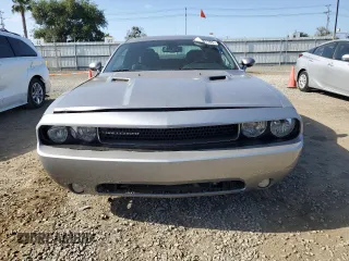 2014 Dodge Challenger R/T z VIN 2C3CDYBT2EH101684, wystawiony jako Copart lot #53581785 z przebiegiem 159 637 mil mil oraz Szkoda całkowita • Salvage title. Historia ofert i sprzedaży dostępna na DreamBid. Obrazek 5.