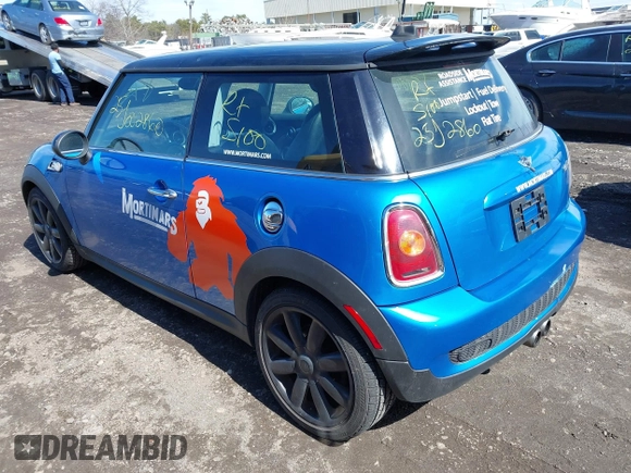 2007 MINI Hardtop S with VIN WMWMF73507TT83203, listed as a IAAI auction lot 41832035 with Not Provided miles and . Bid and sale history available at DreamBid. Image 3.