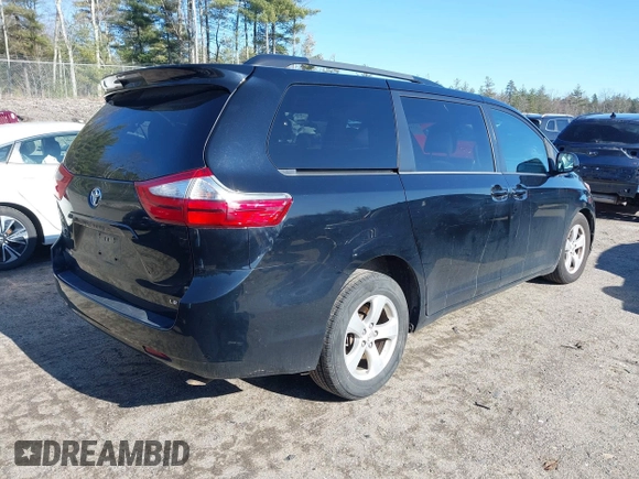 2015 Toyota Sienna LE AAS with VIN 5TDKK3DCXFS594370, listed as a IAAI auction lot 41910126 with 131,638 mi miles. Bid and sale history available at carsss.com. Image 4.