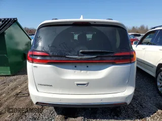 2021 Chrysler Pacifica Touring L with VIN 2C4RC1BGXMR532883, listed as a Copart auction lot 50173485 with 154,431 mi miles and Salvage Title. Bid and sale history available at DreamBid. Image 6.