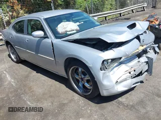 2006 Dodge Charger R/T with VIN 2B3KA53H56H513111, listed as a IAAI auction lot 41977236 with 173,048 mi miles and . Bid and sale history available at carsss.com. Image 1.