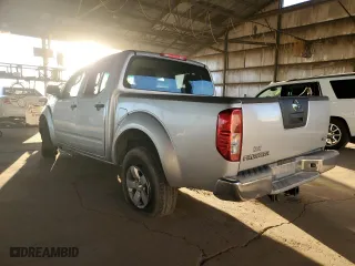 2009 Nissan Frontier SE with VIN 1N6AD07U49C405644, listed as a Copart auction lot 44342525 with 212,826 mi miles and Salvage Title. Bid and sale history available at carsss.com. Image 2.
