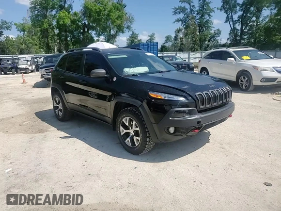 2017 Jeep Cherokee Trailhawk L Plus with VIN 1C4PJMBBXHW517252, listed as a Copart auction lot 51414315 with 185,274 mi miles and Salvage Title. Bid and sale history available at carsss.com. Image 11.