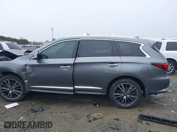2016 Infiniti QX60 with VIN 5N1AL0MM1GC502111, listed as a IAAI auction lot 41866740 with 97,360 mi miles and . Bid and sale history available at DreamBid. Image 15.