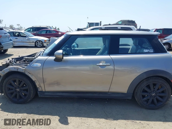 2017 MINI Hardtop Cooper S with VIN WMWXP7C34H2C61768, listed as a IAAI auction lot 42579522 with 67,876 mi miles and . Bid and sale history available at DreamBid. Image 15.