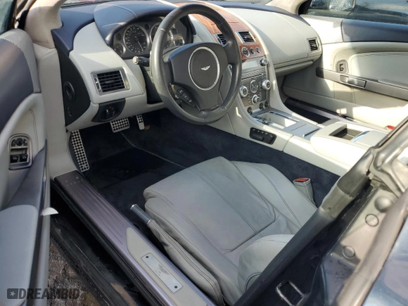 2009 Aston Martin DB9 with VIN SCFAD02E79GB10991, listed as a Copart auction lot 85487894 with 0 mi miles and Salvage Title. Bid and sale history available at carsss.com. Image 8.