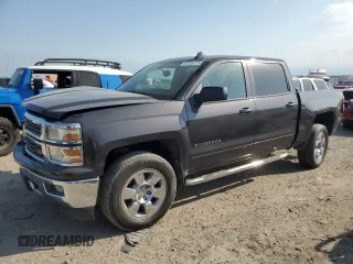 2015 Chevrolet Silverado 1500 LT with VIN 3GCUKREH8FG157973, listed as a Copart auction lot 52969715 with 131,189 mi miles and Salvage Title. Bid and sale history available at DreamBid. Image 1.
