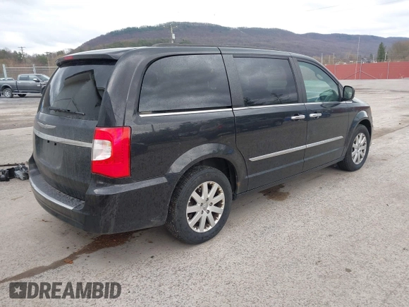 2014 Chrysler Town & Country Touring with VIN 2C4RC1BG4ER469409, listed as a IAAI auction lot 41919315 with 135,894 mi miles. Bid and sale history available at carsss.com. Image 4.