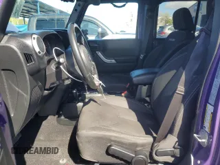 2017 Jeep Wrangler Unlimited Sahara with VIN 1C4BJWEG8HL657654, listed as a Copart auction lot 51763015 with 87,949 mi miles and Salvage Title. Bid and sale history available at carsss.com. Image 7.