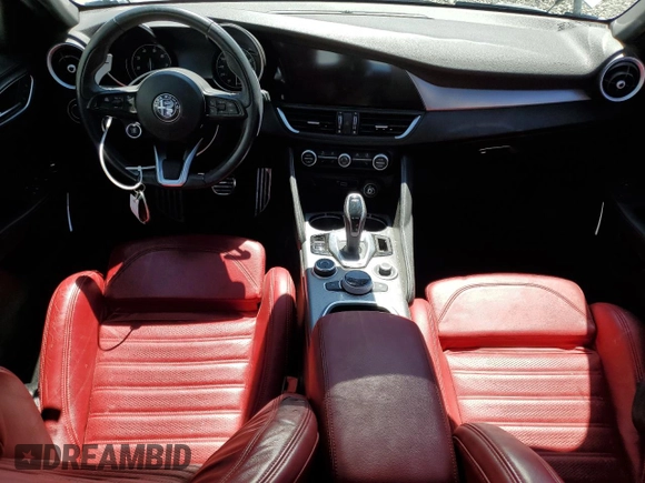 2022 Alfa Romeo Giulia Veloce с VIN ZARFAMBNXN7664866, выставлен на аукционе Copart как лот 55639185 с пробегом Не указан миль и Списание • Salvage title. История ставок и продаж доступна на DreamBid. Изображение 8.