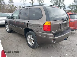 2008 GMC Envoy SLE2 with VIN 1GKDS13S882139862, listed as a IAAI auction lot 41458976 with 195,973 mi miles. Bid and sale history available at carsss.com. Image 3.