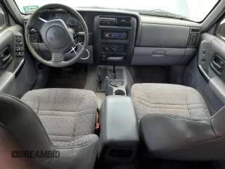 1998 Jeep Cherokee Sport with VIN 1J4FJ68S6WL215447, listed as a Copart auction lot 65186505 with 177,682 mi miles and Clean title. Bid and sale history available at DreamBid. Image 8.