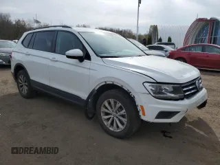 2019 Volkswagen Tiguan S with VIN 3VV0B7AX7KM106090, listed as a Copart auction lot 54771435 with 101,711 mi miles and Salvage title. Bid and sale history available at DreamBid. Image 4.