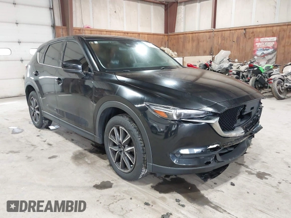 2017 Mazda CX-5 Grand Touring with VIN JM3KFBDL6H0143013, listed as a IAAI auction lot 41912979 with 122,890 mi miles. Bid and sale history available at carsss.com. Image 18.