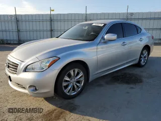 2012 Infiniti M with VIN JN1BY1AP9CM336121, listed as a Copart auction lot 71656374 with 125,497 mi miles and Salvage Title. Bid and sale history available at DreamBid. Image 1.