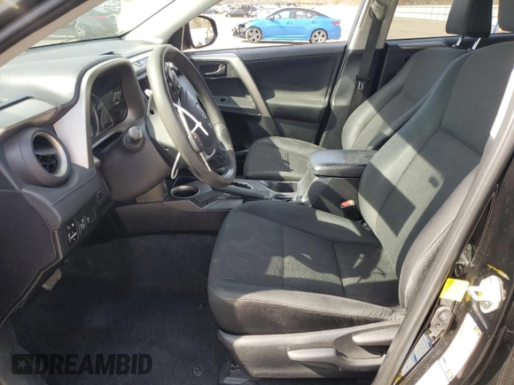 2015 Toyota RAV4 LE with VIN 2T3BFREV0FW296593, listed as a Copart auction lot 54052395 with 106,702 mi miles and Salvage title. Bid and sale history available at DreamBid. Image 7.