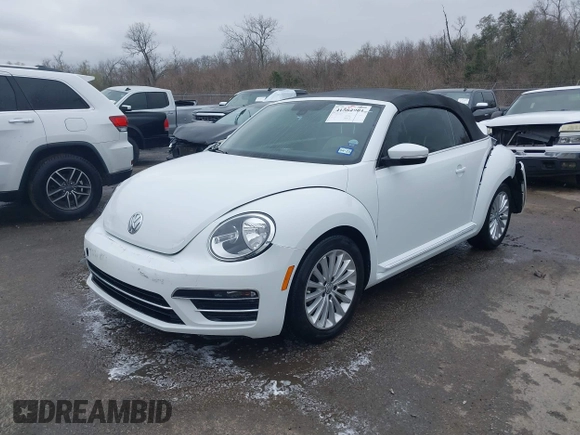 2019 Volkswagen Beetle S with VIN 3VW5DAAT4KM504847, listed as a IAAI auction lot 41582981 with 54,546 mi miles and . Bid and sale history available at DreamBid. Image 18.