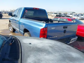 2002 Dodge Ram 1500 with VIN 3D7HA18N62G111162, listed as a IAAI auction lot 41483386 with 239,677 mi miles. Bid and sale history available at carsss.com. Image 3.
