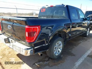 2023 Ford F-150 XL with VIN 1FTEW1C81PKE14835, listed as a IAAI auction lot 41502717 with 47,969 mi miles and . Bid and sale history available at DreamBid. Image 4.