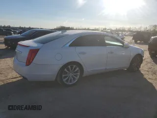 2016 Cadillac XTS Luxury Collection with VIN 2G61M5S38G9108012, listed as a Copart auction lot 88417485 with 134,811 mi miles and Salvage title. Bid and sale history available at DreamBid. Image 3.