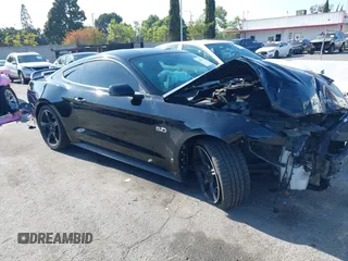 2017 Ford Mustang GT z VIN 1FA6P8CF8H5210452, wystawiony jako IAAI lot #42043563 z przebiegiem 77 068 mil mil oraz . Historia ofert i sprzedaży dostępna na DreamBid. Obrazek 1.