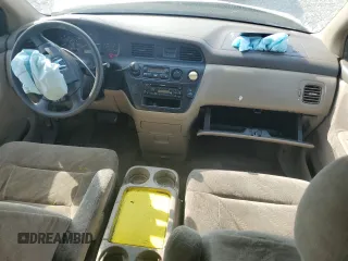 2002 Honda Odyssey EX z VIN 2HKRL18612H503328, wystawiony jako Copart lot #52699095 z przebiegiem 241 741 mil mil oraz Szkoda całkowita • Salvage title. Historia ofert i sprzedaży dostępna na DreamBid. Obrazek 8.