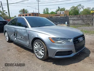 2014 Audi A6 Prestige z VIN WAUHGAFC7EN075565, wystawiony jako IAAI lot #42395623 z przebiegiem 199 424 mil mil oraz . Historia ofert i sprzedaży dostępna na DreamBid. Obrazek 1.