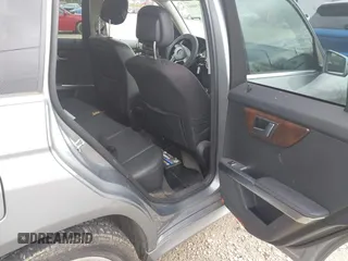2015 Mercedes-Benz GLK with VIN WDCGG8JB3FG371995, listed as a IAAI auction lot 41738061 with 108,857 mi miles. Bid and sale history available at carsss.com. Image 8.