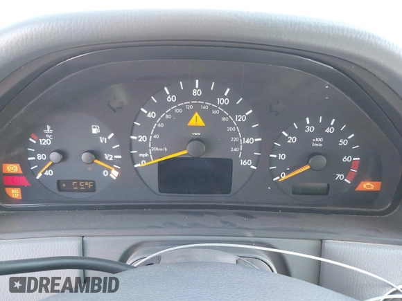 2002 Mercedes-Benz E-Class with VIN WDBJF82J62X076581, listed as a IAAI auction lot 41194976 with 235,453 mi miles. Bid and sale history available at carsss.com. Image 7.