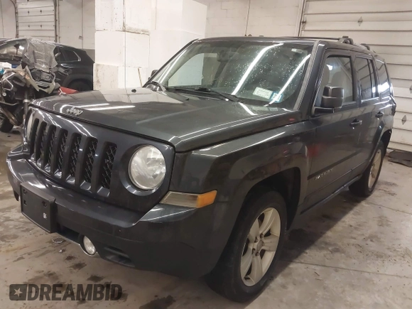 2014 Jeep Patriot Limited with VIN 1C4NJRCB7ED684811, listed as a IAAI auction lot 41833010 with 74,820 mi miles and . Bid and sale history available at carsss.com. Image 2.