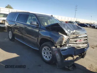 2019 GMC Yukon XL SLT with VIN 1GKS2GKC3KR296430, listed as a Copart auction lot 49179235 with 41,647 mi miles and Salvage title. Bid and sale history available at DreamBid. Image 4.