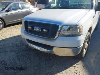 2004 Ford F-150 XL with VIN 1FTRF12W74NC52818, listed as a IAAI auction lot 41807293 with 291,166 mi miles. Bid and sale history available at carsss.com. Image 6.