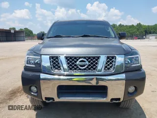 2011 Nissan Titan Pro-4X with VIN 1N6AA0CC3BN313442, listed as a IAAI auction lot 42582789 with 189,582 mi miles and . Bid and sale history available at DreamBid. Image 12.