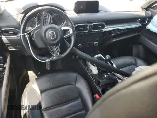 2018 Mazda CX-5 Grand Touring z VIN JM3KFADM3J1464073, wystawiony jako Copart lot #59571385 z przebiegiem Nie podano mil oraz Szkoda całkowita • Salvage title. Historia ofert i sprzedaży dostępna na DreamBid. Obrazek 8.