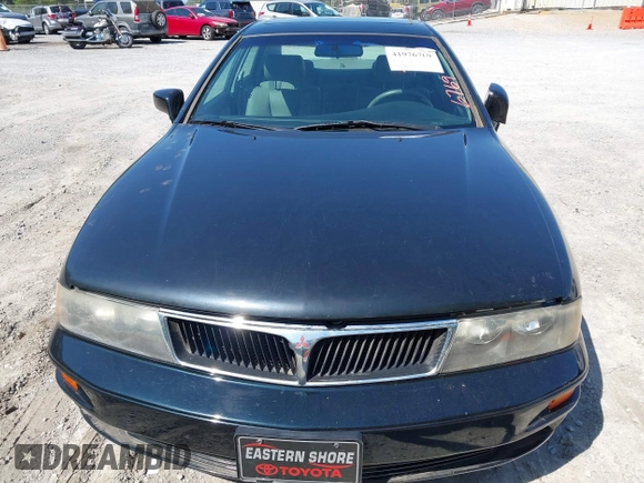 2001 Mitsubishi Diamante LS z VIN 6MMAP67P01T009373, wystawiony jako IAAI lot #41976769 z przebiegiem Nie podano mil oraz . Historia ofert i sprzedaży dostępna na DreamBid. Obrazek 6.