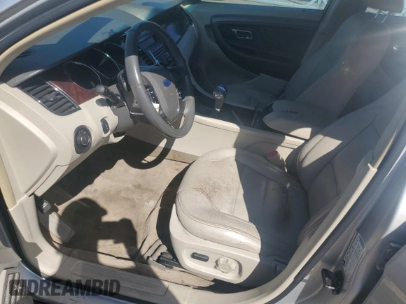 2011 Ford Taurus SEL z VIN 1FAHP2EW2BG176510, wystawiony jako Copart lot #51081085 z przebiegiem 261 031 mil mil oraz Szkoda całkowita • Salvage title. Historia ofert i sprzedaży dostępna na DreamBid. Obrazek 7.
