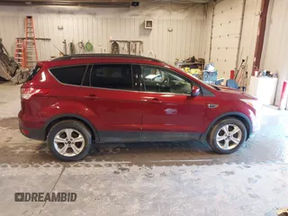 2016 Ford Escape SE with VIN 1FMCU9G96GUB81842, listed as a IAAI auction lot 41942182 with 207,112 mi miles. Bid and sale history available at carsss.com. Image 13.