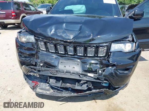 2018 Jeep Grand Cherokee Upland with VIN 1C4RJFAG2JC350975, listed as a IAAI auction lot 42612836 with 148,435 mi miles and . Bid and sale history available at DreamBid. Image 6.