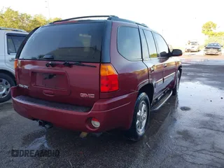 2003 GMC Envoy SLT with VIN 1GKDS13S132118361, listed as a IAAI auction lot 41909425 with 283,342 mi miles. Bid and sale history available at carsss.com. Image 4.