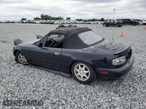 1994 Mazda MX-5 Miata with VIN JM1NA3534R0513305, listed as a Copart auction lot 52489865 with 150,481 mi miles and Salvage title. Bid and sale history available at DreamBid. Image 2.