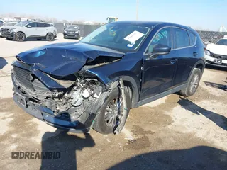 2017 Mazda CX-5 Touring with VIN JM3KFACL1H0192549, listed as a IAAI auction lot 41667781 with 89,030 mi miles. Bid and sale history available at carsss.com. Image 17.