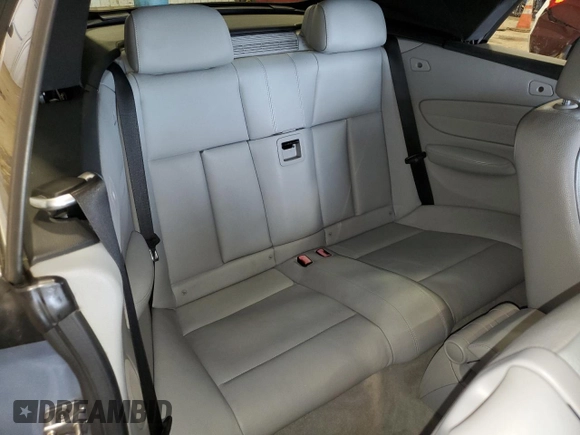 2011 BMW 1 Series 128i with VIN WBAUL7C57BVM80274, listed as a Copart auction lot 52127595 with 104,952 mi miles and Salvage title. Bid and sale history available at DreamBid. Image 10.