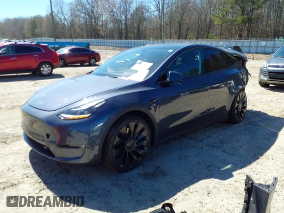 2022 Tesla Model Y Performance with VIN 7SAYGDEF9NF544205, listed as a IAAI auction lot 41825453 with 33,039 mi miles and . Bid and sale history available at DreamBid. Image 2.