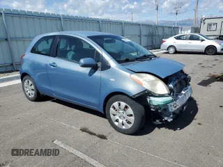 2008 Toyota Yaris with VIN JTDJT923185164654, listed as a Copart auction lot 54052575 with 242,505 mi miles and Salvage Title. Bid and sale history available at DreamBid. Image 4.