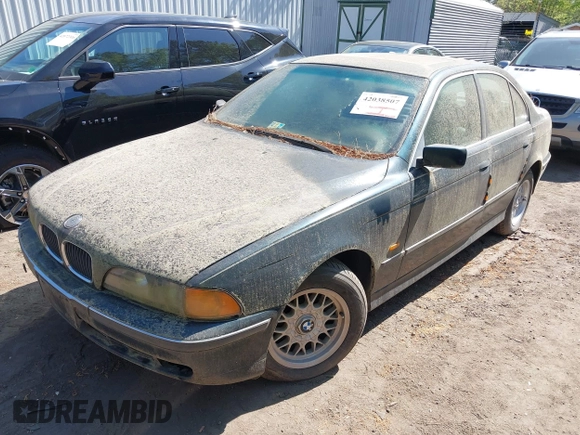 1997 BMW 5 Series 528iA with VIN WBADD6329VBW04841, listed as a IAAI auction lot 42038507 with 147,762 mi miles. Bid and sale history available at carsss.com. Image 2.