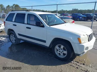 2005 Jeep Grand Cherokee Laredo with VIN 1J4GS48N75C505209, listed as a IAAI auction lot 41452637 with 263,653 mi miles. Bid and sale history available at carsss.com. Image 1.