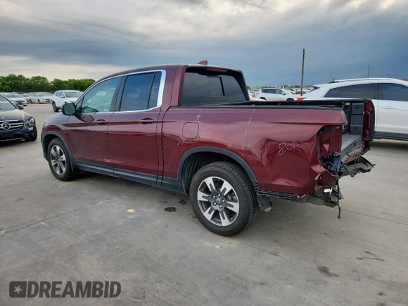 2019 Honda Ridgeline RTL-T with VIN 5FPYK2F60KB002573, listed as a Copart auction lot 63570755 with 111,388 mi miles and Salvage title. Bid and sale history available at DreamBid. Image 2.
