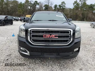 2018 GMC Yukon SLE with VIN 1GKS2AKC6JR291329, listed as a Copart auction lot 87667245 with 73,005 mi miles and Salvage Title. Bid and sale history available at carsss.com. Image 5.